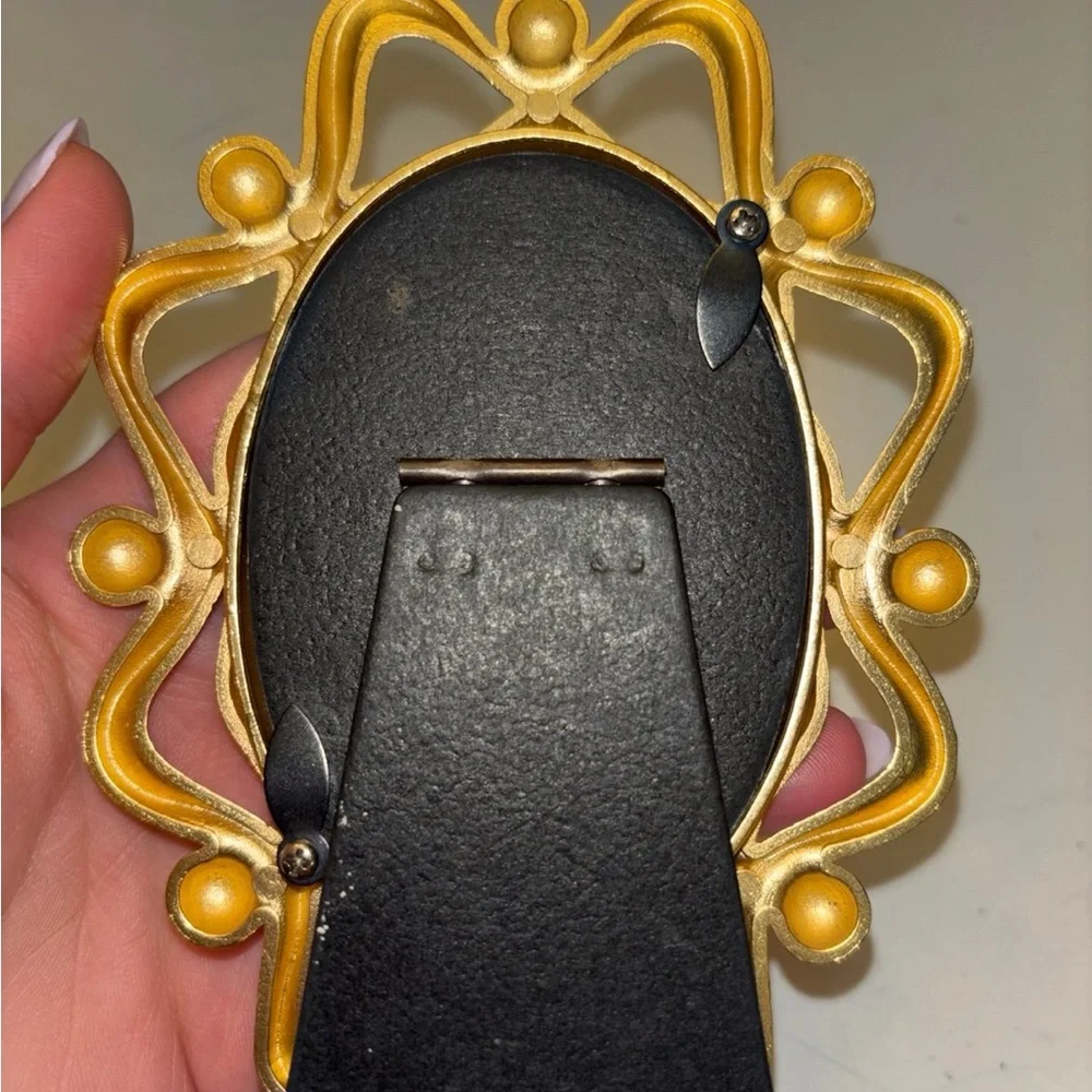 Gold tone mini picture frame